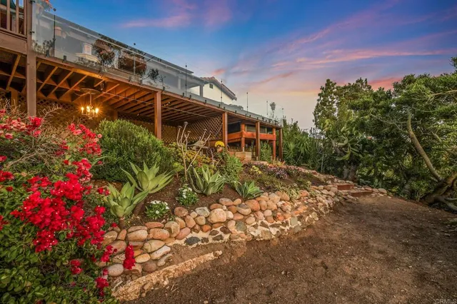 a bedroom with a bed couch and window