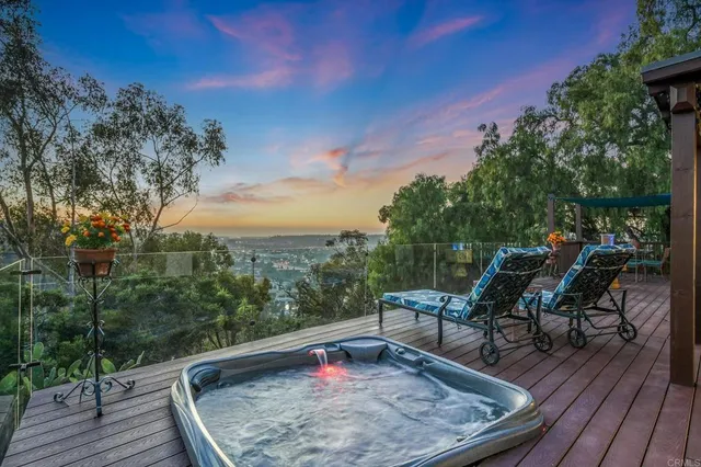 a view of a chairs on the roof deck