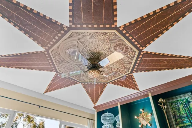 a workspace with wooden floor and a mirror