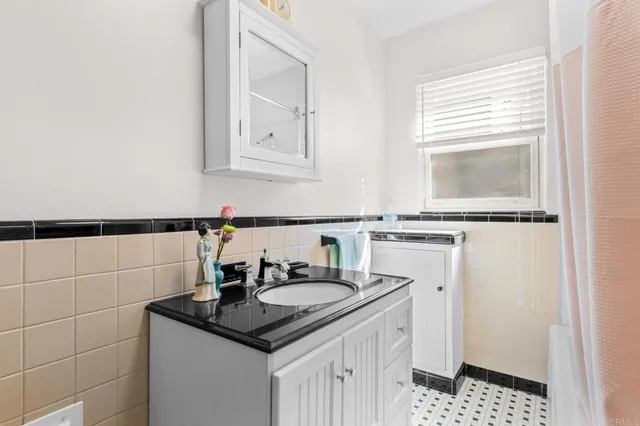 a view of a hallway with washer and dryer