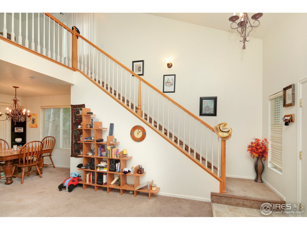 1902 Falcon Ridge Drive, Unit B Fort Collins, CO 80528 - Photo 3 of 19 Foyer and Staircase