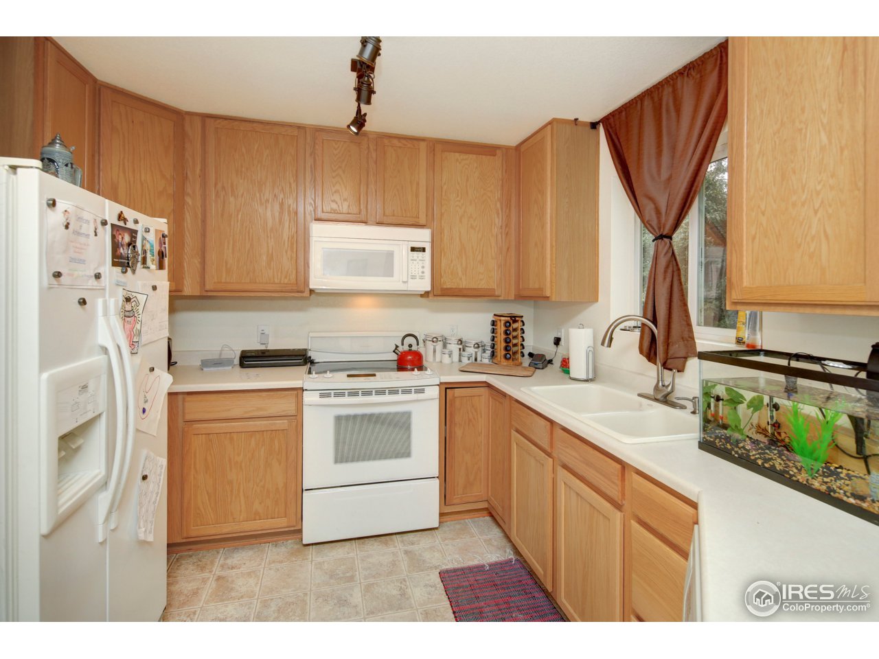 1902 Falcon Ridge Drive, Unit B Fort Collins, CO 80528 - Photo 10 of 19 Kitchen