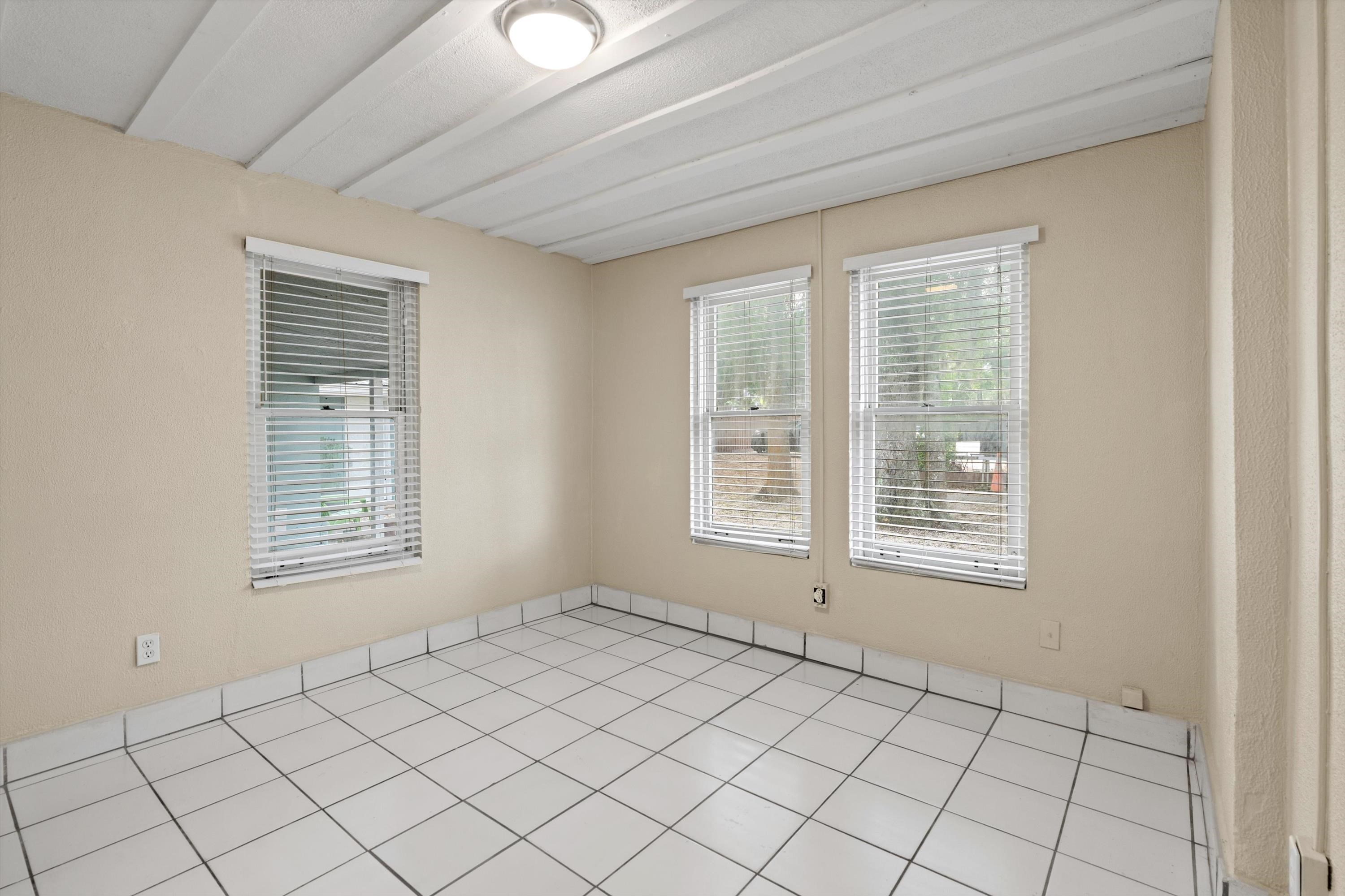 137 A Riberia Street St. Augustine, FL 32084 - Photo 12 of 21 a view of an empty room with window