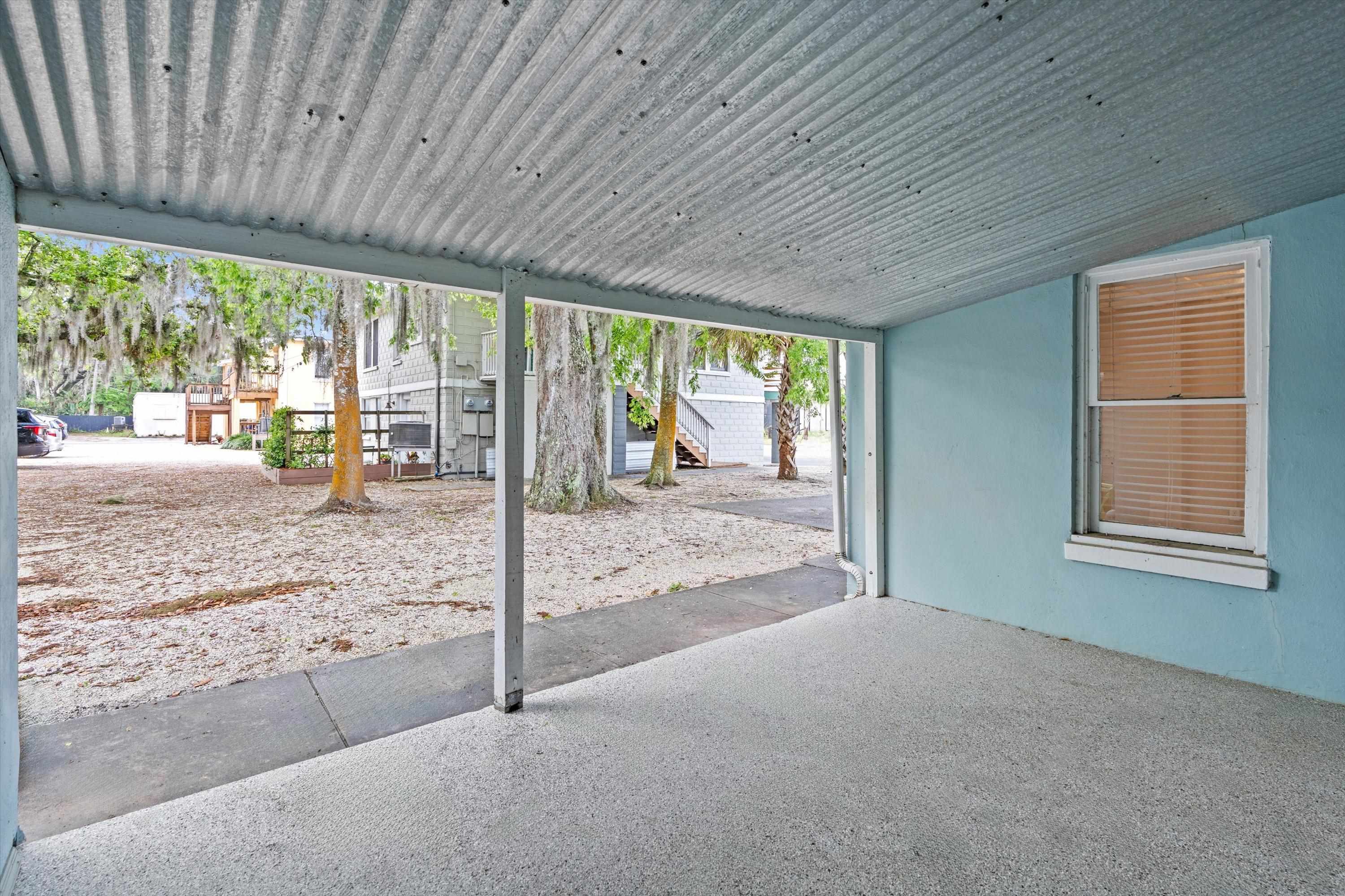 137 A Riberia Street St. Augustine, FL 32084 - Photo 16 of 21 a view of a porch with wooden floor and roof