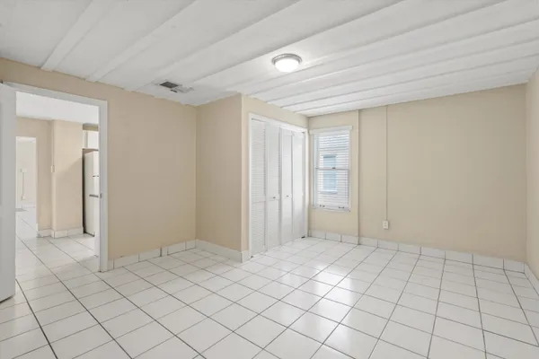 a view of an empty room and window