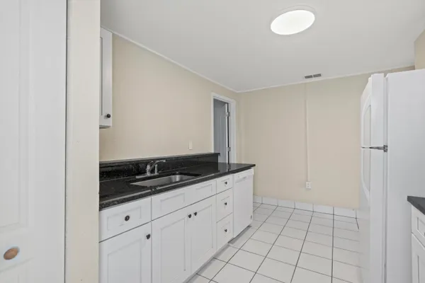 a view of cabinets and window