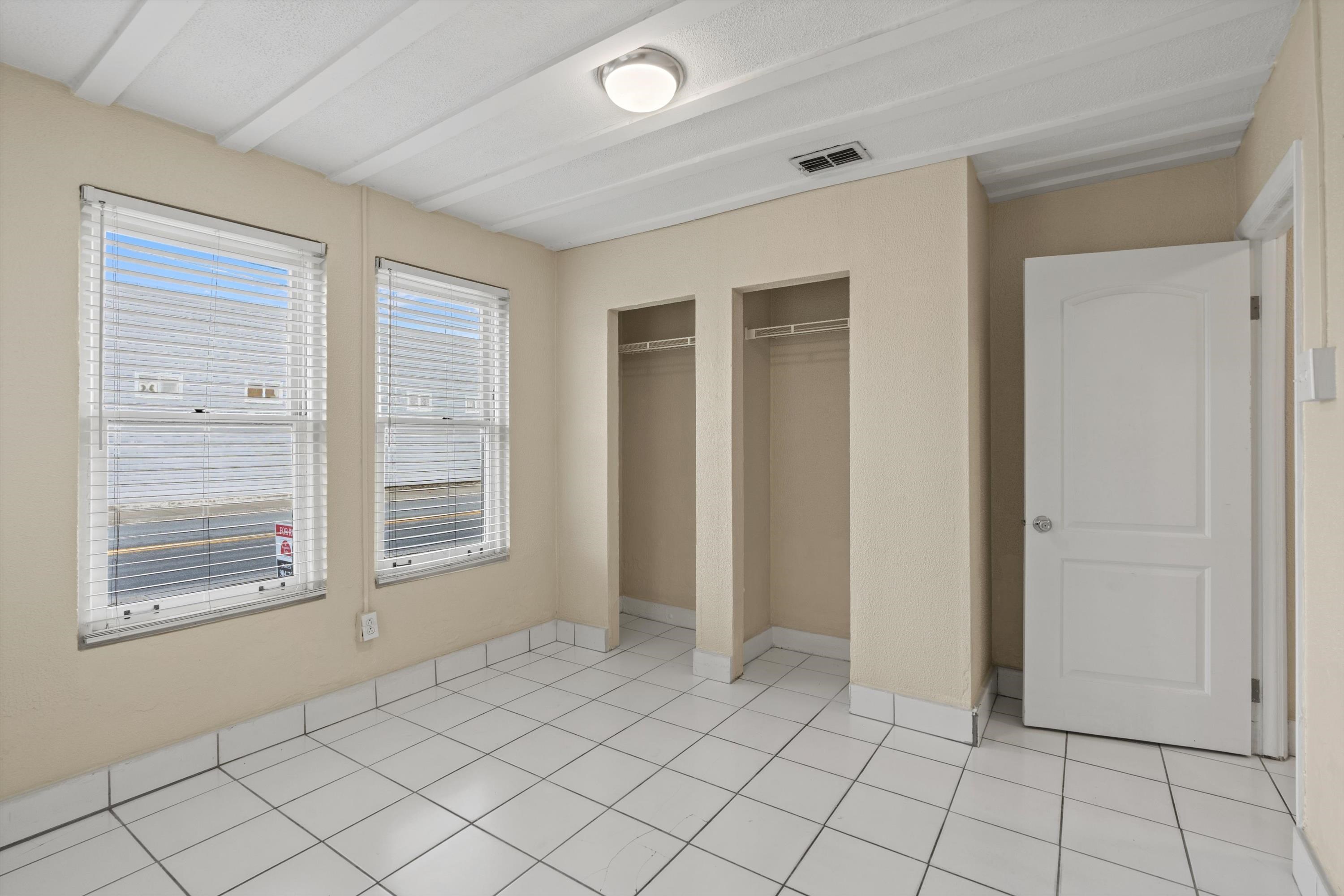 137 A Riberia Street St. Augustine, FL 32084 - Photo 10 of 21 an empty room with window