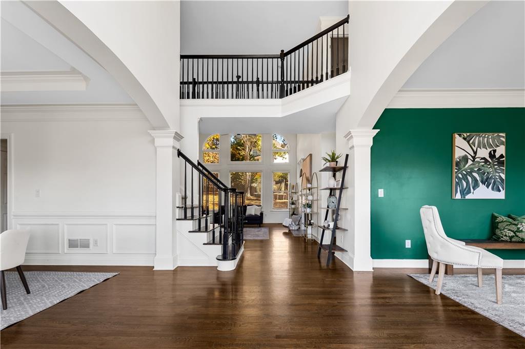 3713 Lake Edge Drive Suwanee, GA 30024 - Photo 2 of 50 a view of entryway and hall with wooden floor