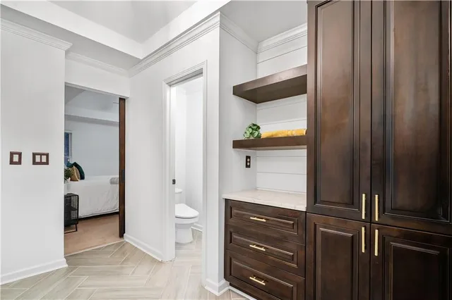 a view of an entryway with wooden floor