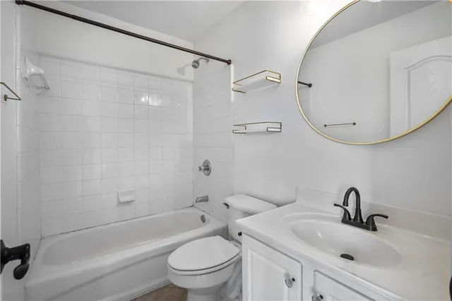 a view of a hallway view with staircase