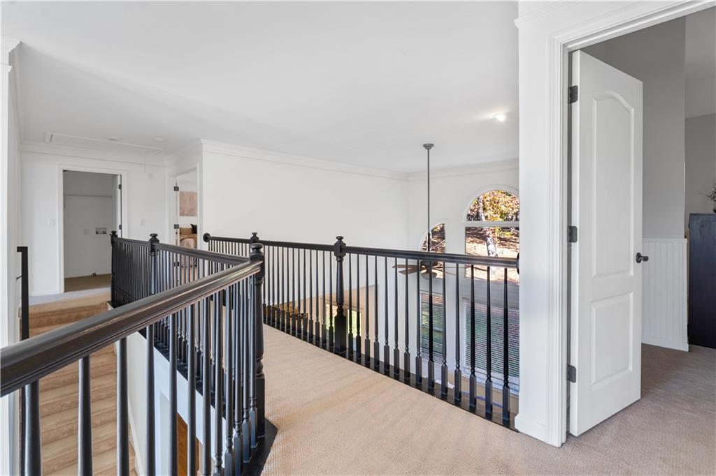 3713 Lake Edge Drive Suwanee, GA 30024 - Photo 29 of 50 a view of a hallway view with staircase