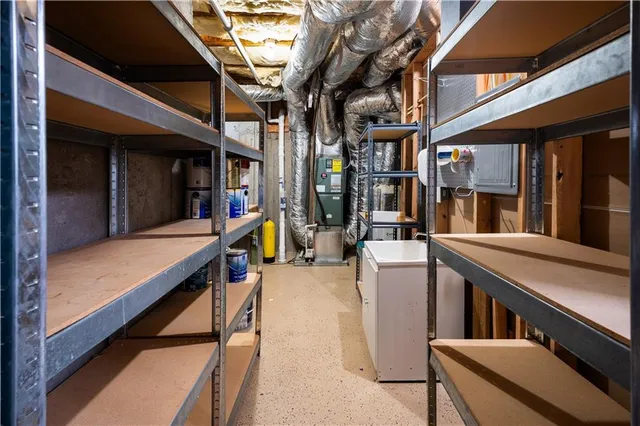 a room with cabinets and wooden floor