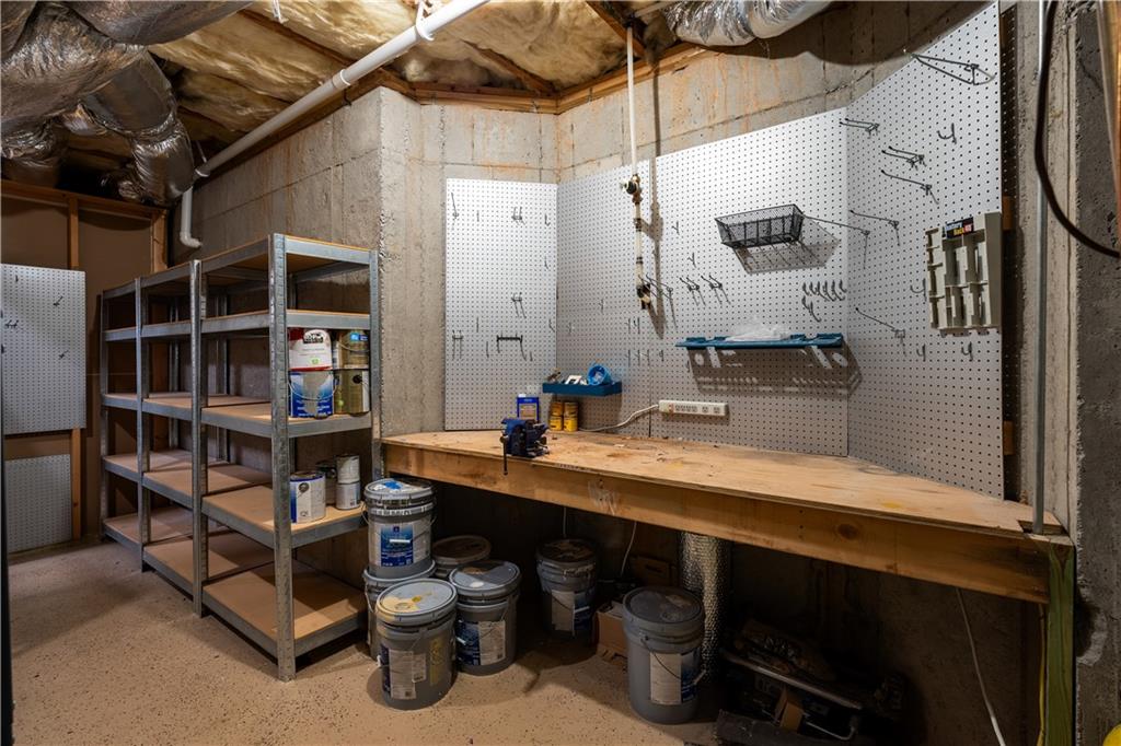 3713 Lake Edge Drive Suwanee, GA 30024 - Photo 45 of 50 a room with cabinets and wooden floor