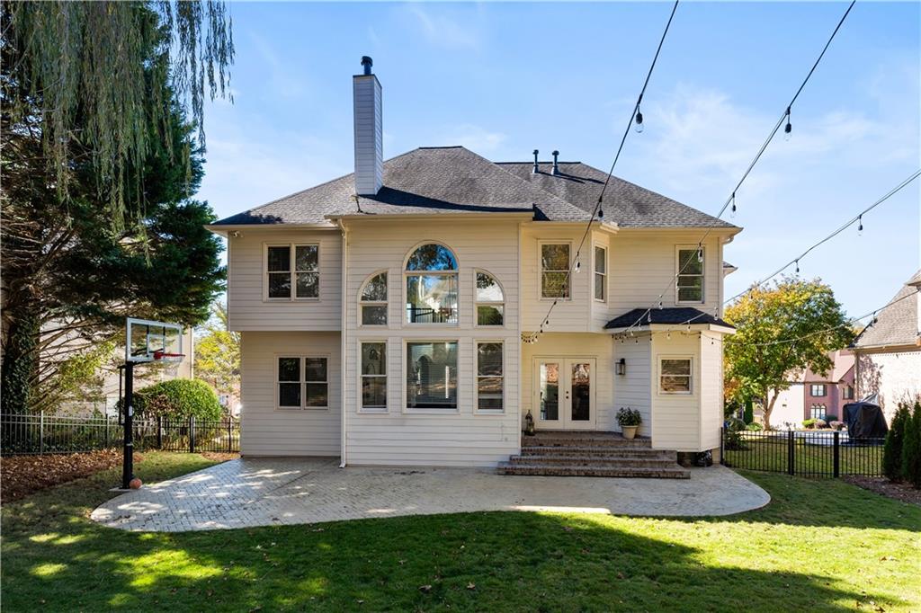 3713 Lake Edge Drive Suwanee, GA 30024 - Photo 48 of 50 a front view of a house with a yard