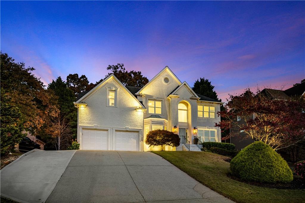 3713 Lake Edge Drive Suwanee, GA 30024 - Photo 50 of 50 a view of a house with a yard