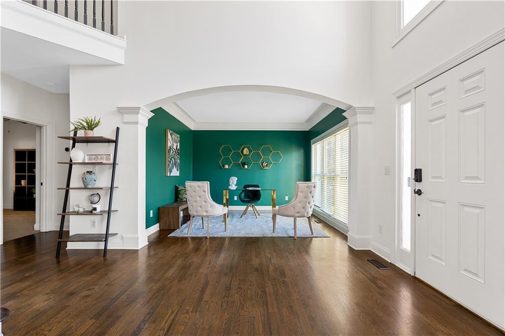 3713 Lake Edge Drive Suwanee, GA 30024 - Photo 7 of 50 a living room with furniture and wooden floor