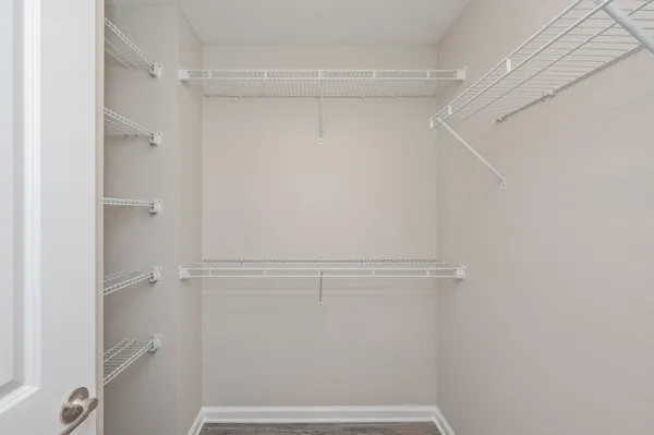 a view of an empty walk in closet