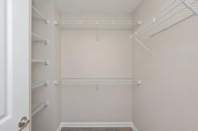 a view of an empty walk in closet