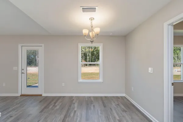 an empty room that has a window