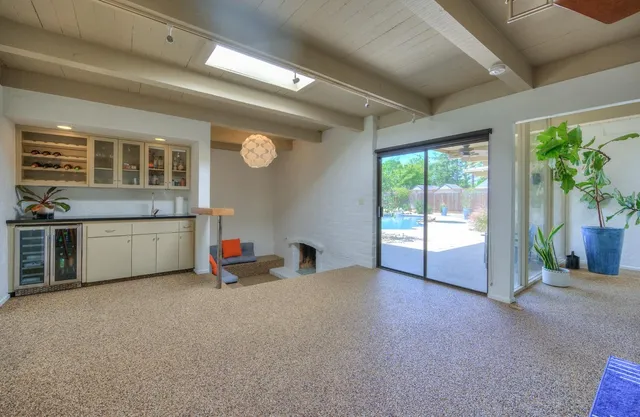 a living room with furniture and a couch
