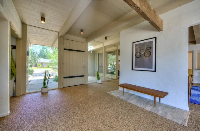 a view of a room with a potted plant