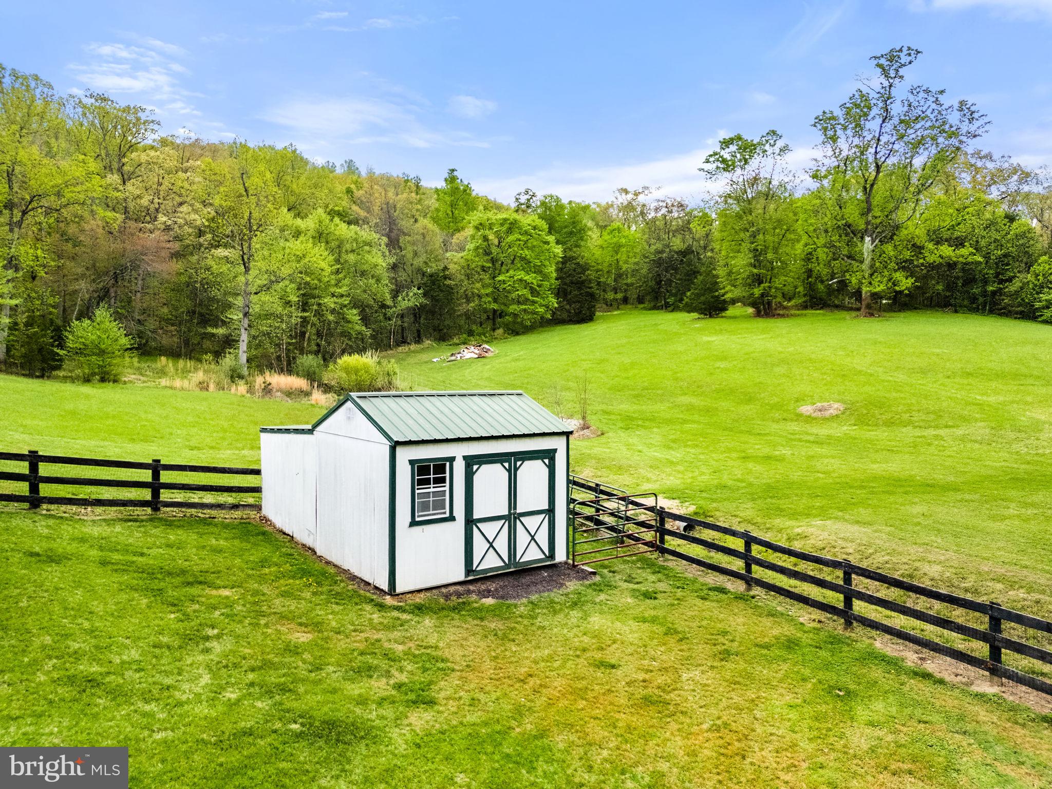 2459 Thoroughfare Road Culpeper, VA 22701 - Photo 11 of 59 a view of a swimming pool with a yard