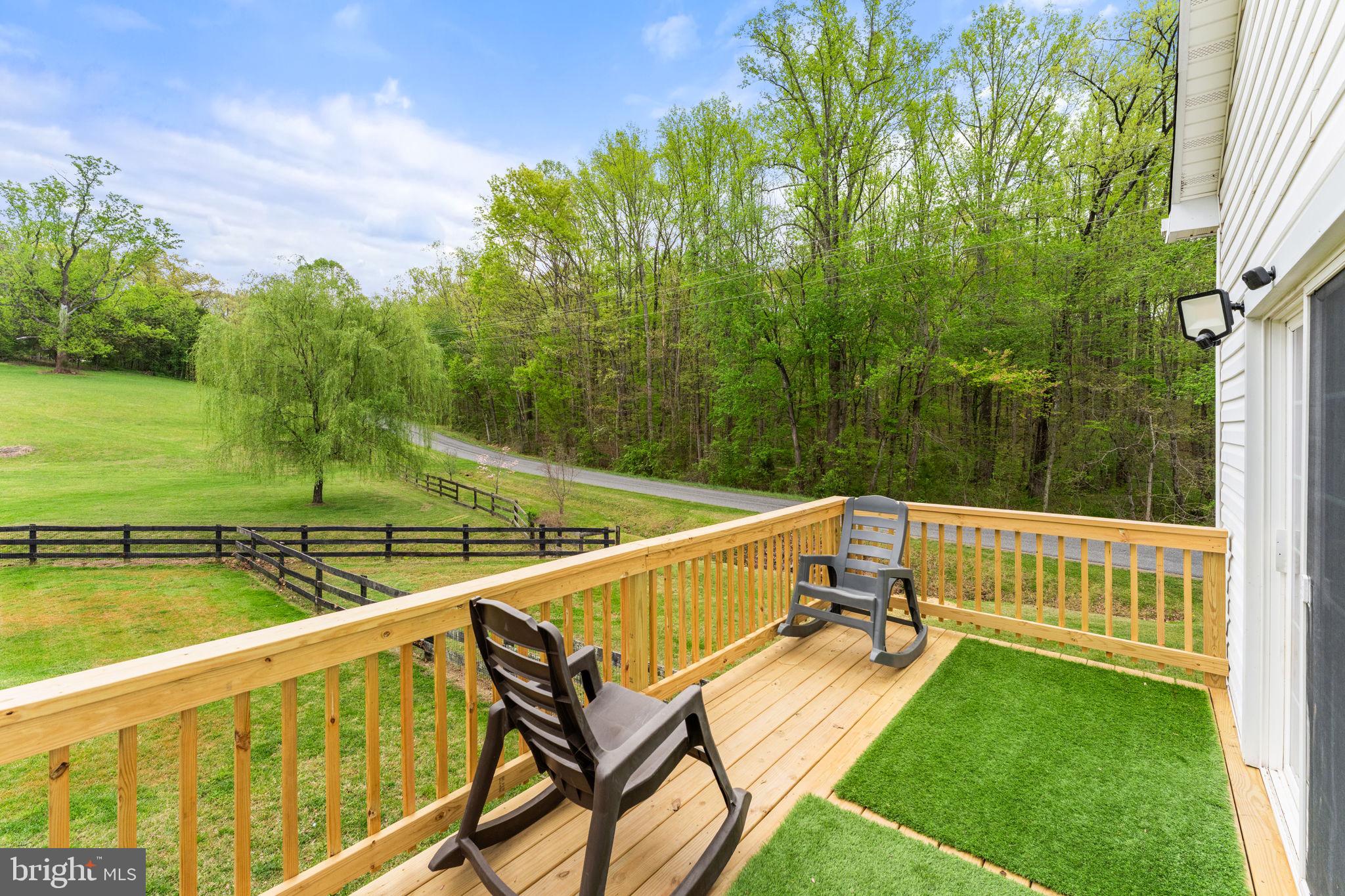 2459 Thoroughfare Road Culpeper, VA 22701 - Photo 14 of 59 a view of a swimming pool with a patio and a garden