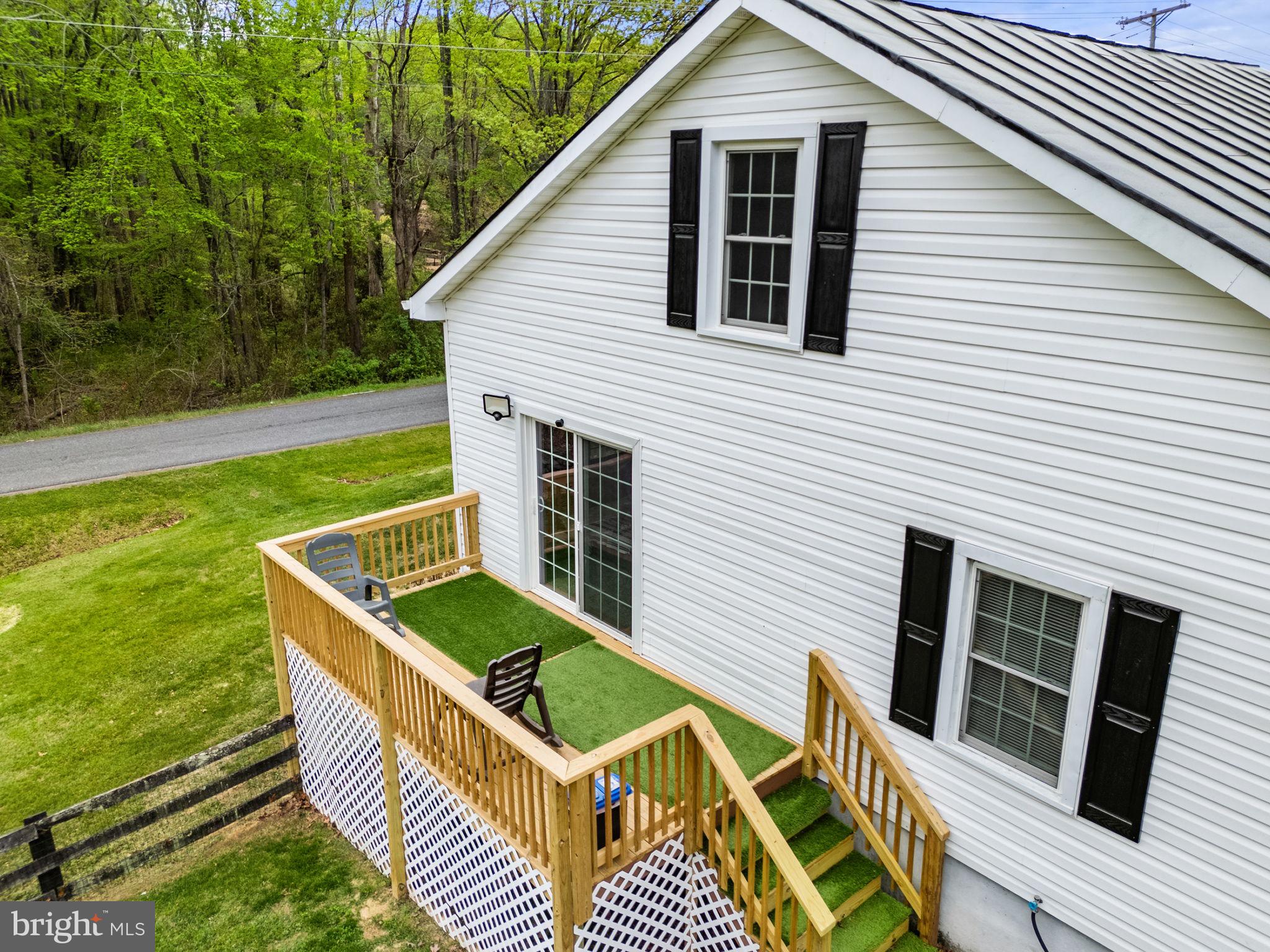 2459 Thoroughfare Road Culpeper, VA 22701 - Photo 3 of 59 a view of a house with backyard and deck