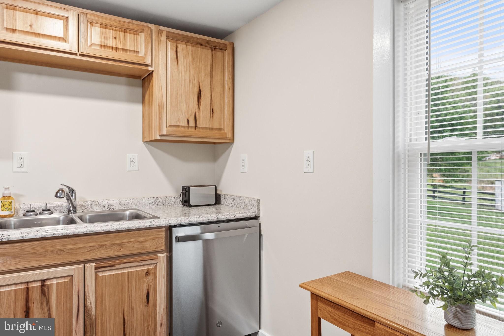2459 Thoroughfare Road Culpeper, VA 22701 - Photo 34 of 59 a kitchen with a sink and a window