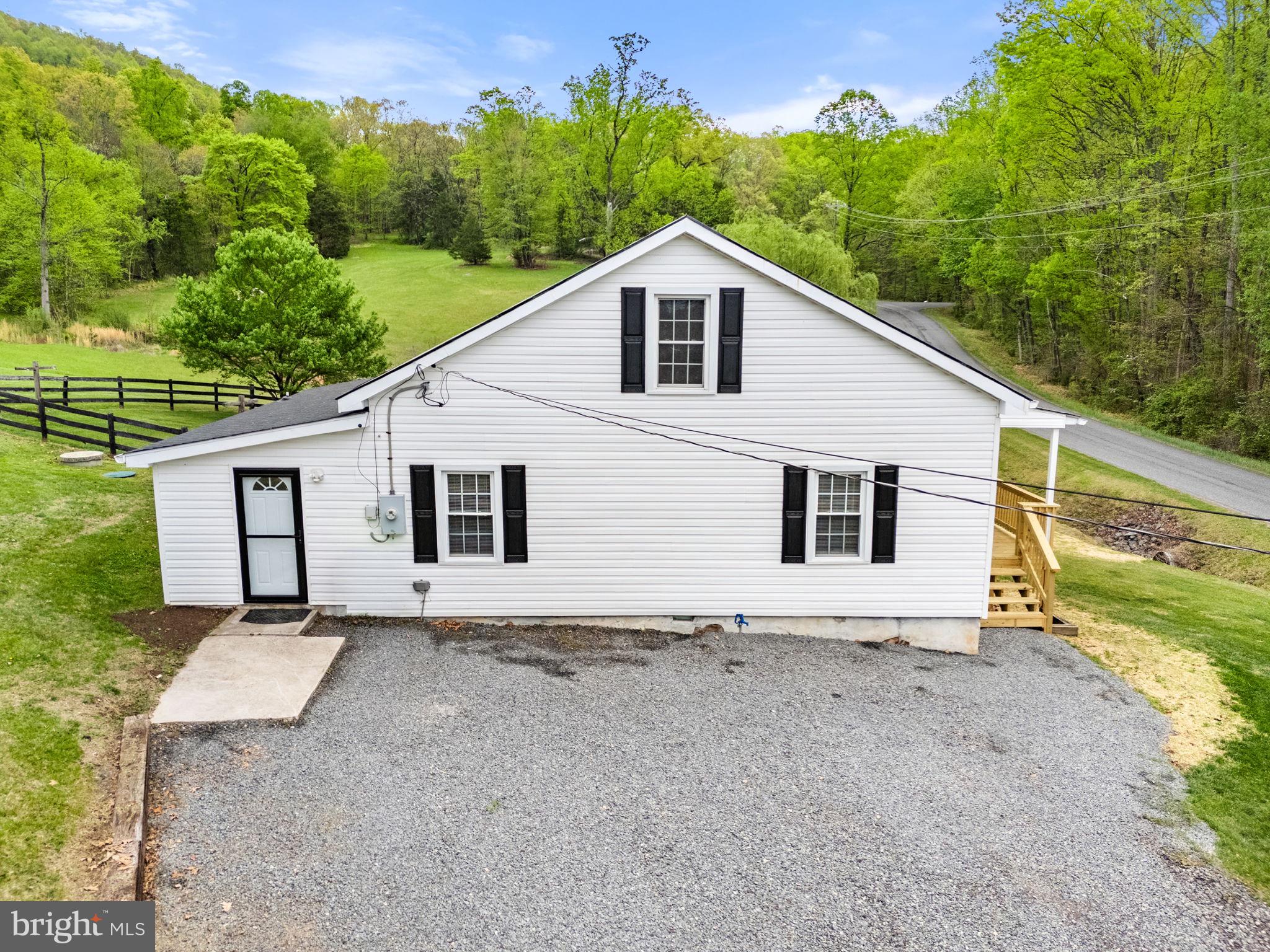 2459 Thoroughfare Road Culpeper, VA 22701 - Photo 4 of 59 a house with trees in the background