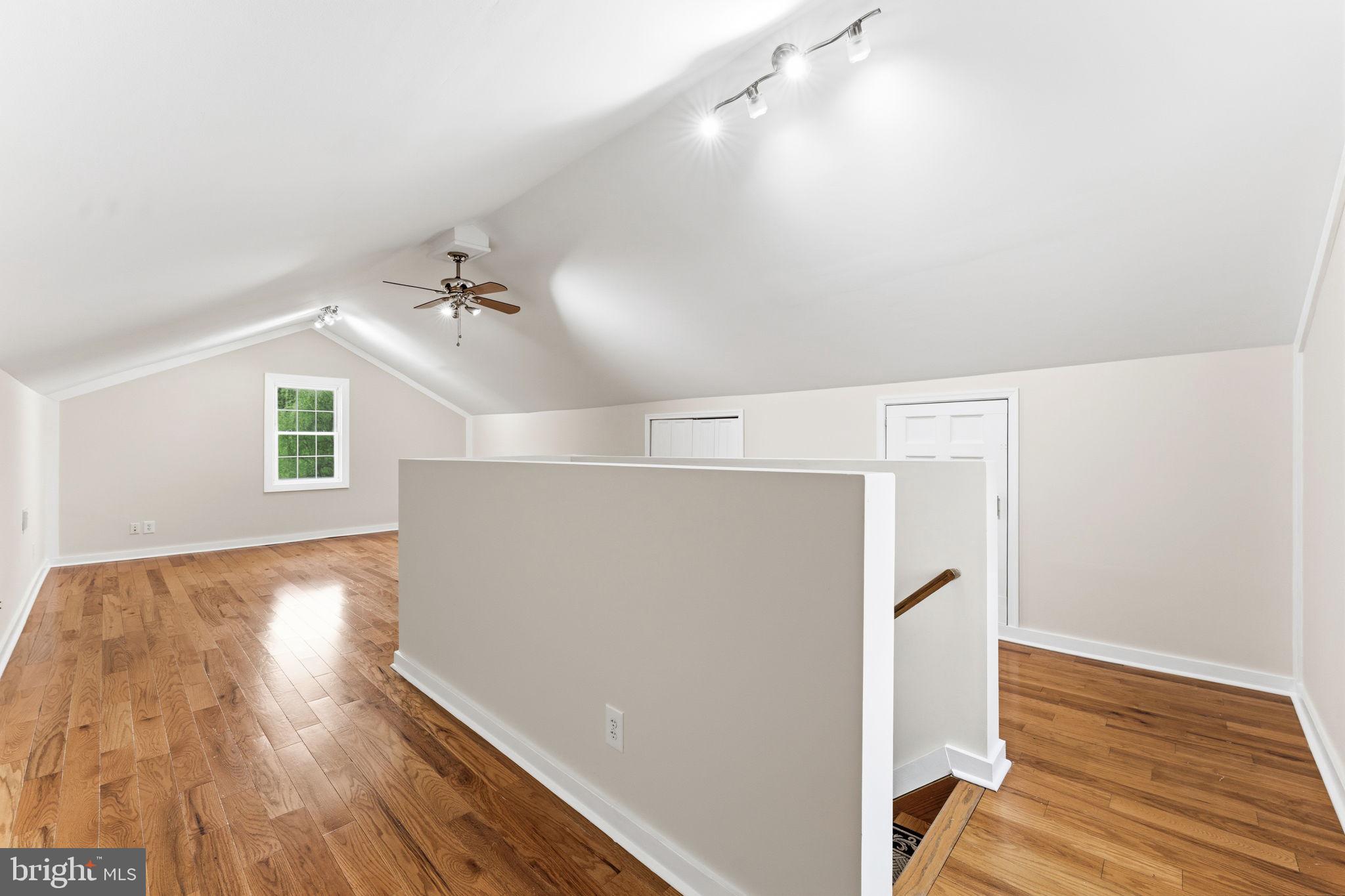 2459 Thoroughfare Road Culpeper, VA 22701 - Photo 46 of 59 wooden floor in an empty room with a window