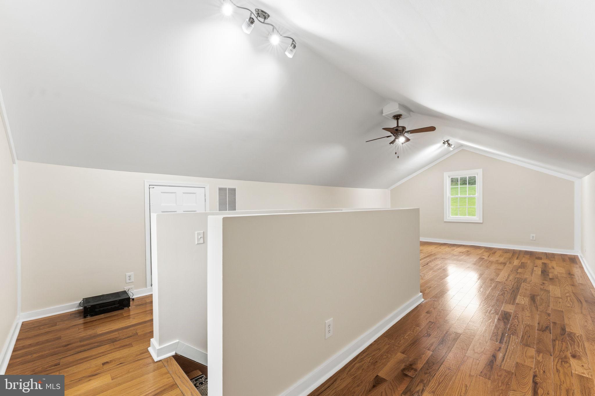 2459 Thoroughfare Road Culpeper, VA 22701 - Photo 56 of 59 wooden floor in an empty room with a window