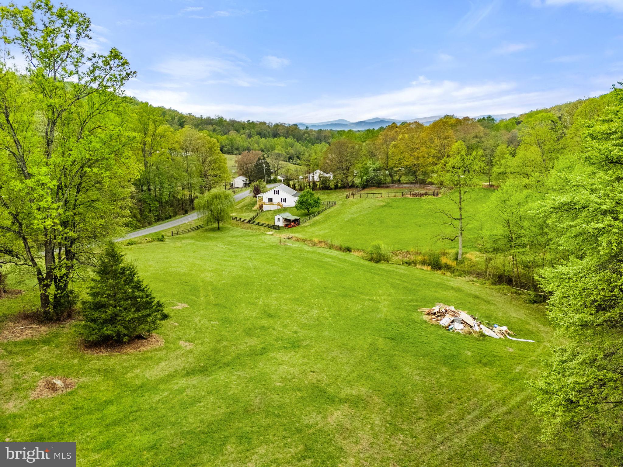 2459 Thoroughfare Road Culpeper, VA 22701 - Photo 7 of 59 a view of a lake with a yard