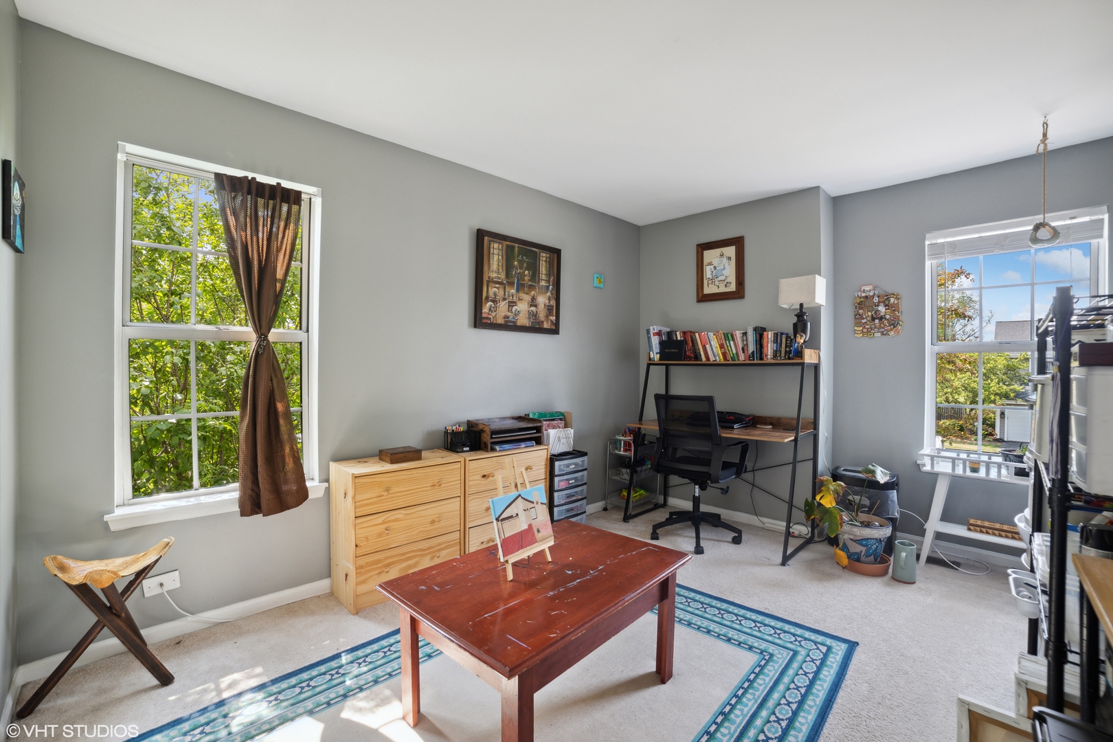 227 Shawnee Circle Bartlett, IL 60103 - Photo 13 of 21 a living room with furniture a rug and a window
