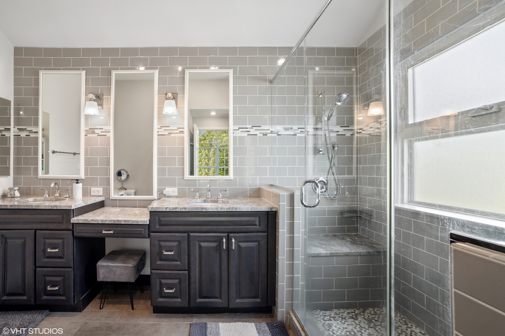 227 Shawnee Circle Bartlett, IL 60103 - Photo 16 of 21 a bathroom with a granite countertop sink a mirror and a shower