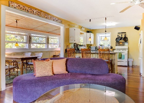 4449 Mahimahi Road Hanalei, HI 96714 - Photo 6 of 20 a living room with furniture a window and kitchen view
