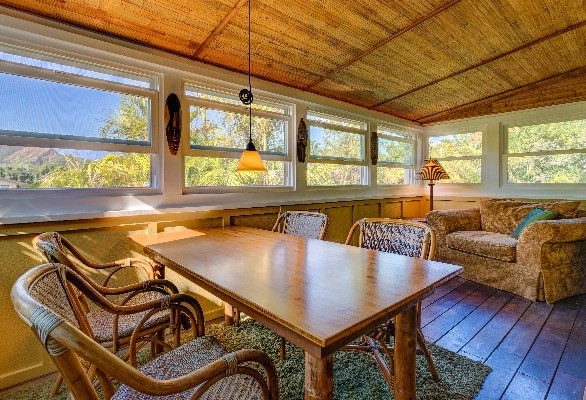 4449 Mahimahi Road Hanalei, HI 96714 - Photo 10 of 20 a living room with furniture and wooden floor