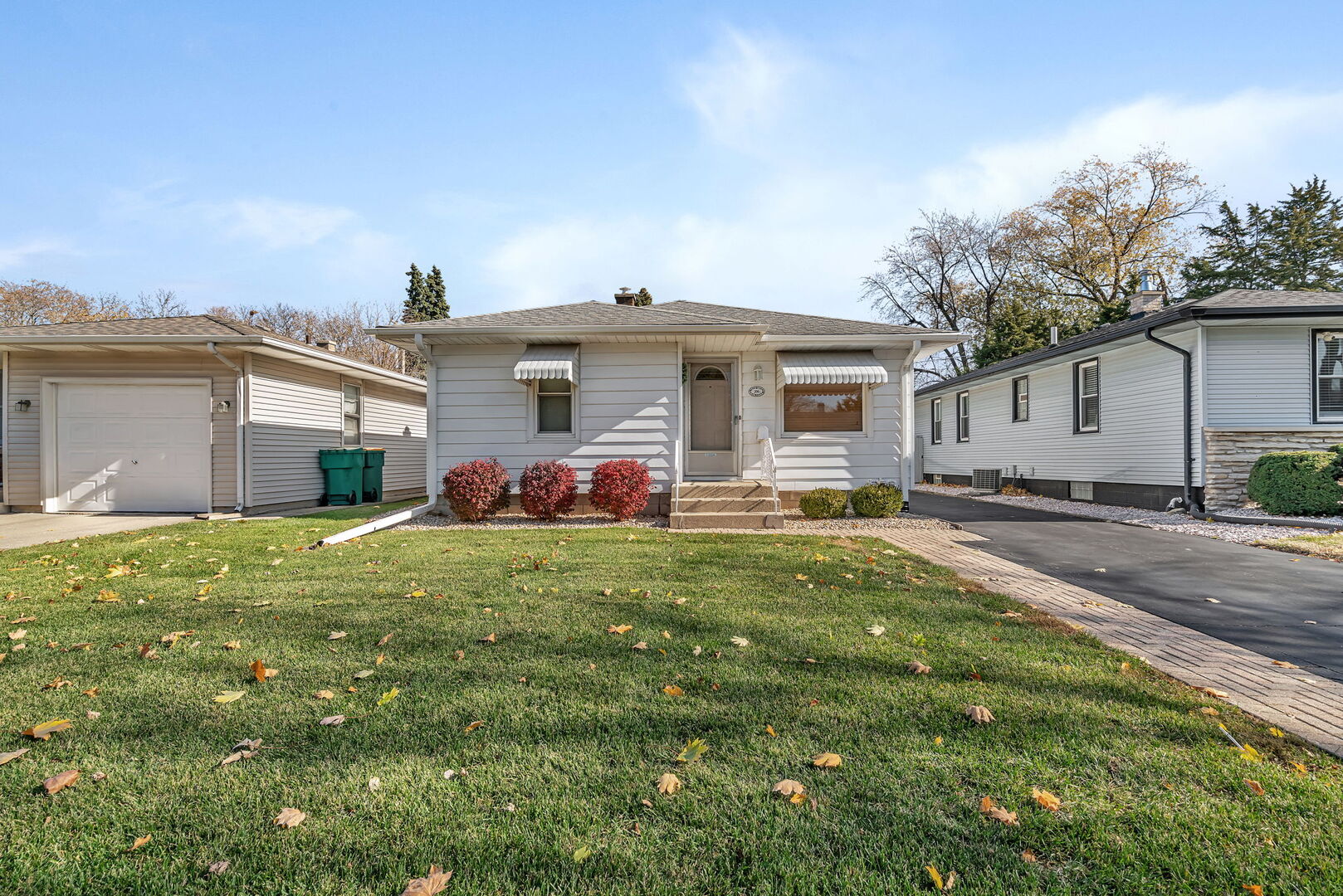 206 South Reed Street Joliet, IL 60436 - Photo 2 of 27 a front view of house with yard and green space
