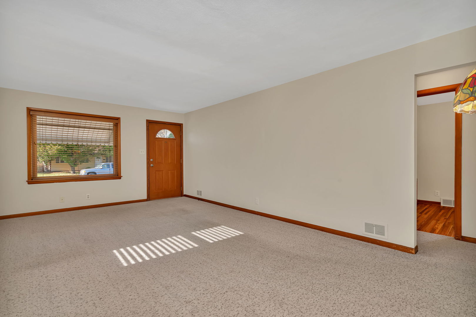 206 South Reed Street Joliet, IL 60436 - Photo 3 of 27 an empty room with windows