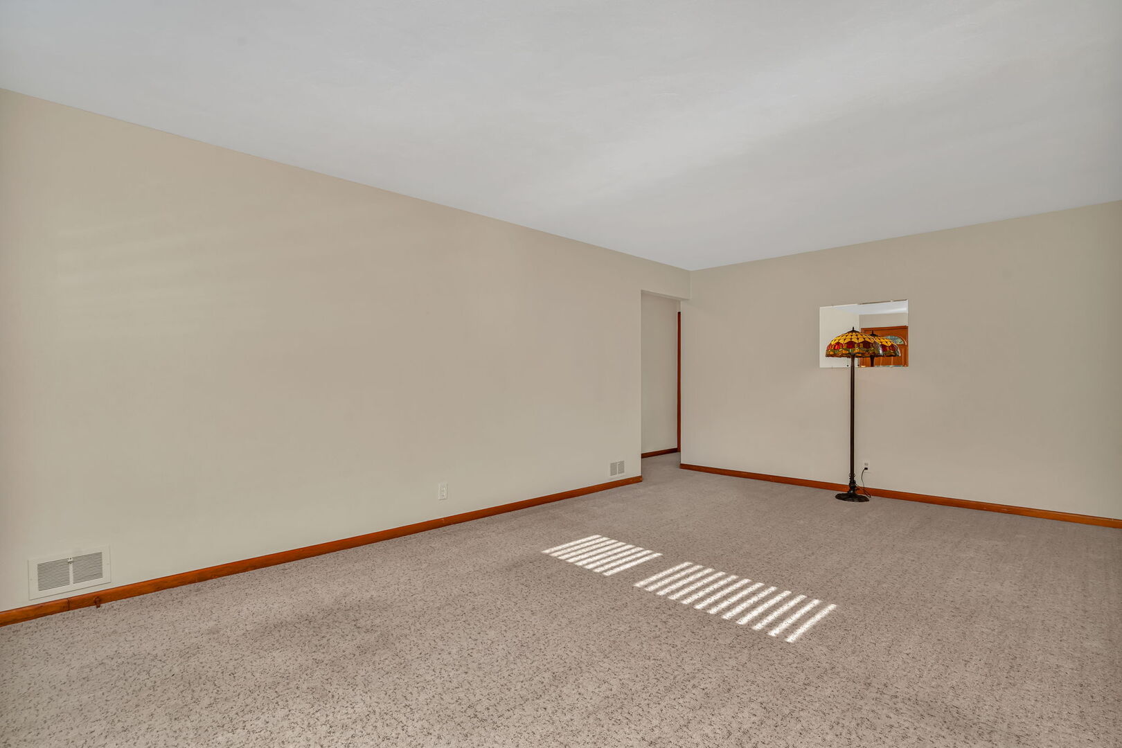 206 South Reed Street Joliet, IL 60436 - Photo 5 of 27 a view of an empty room with a window