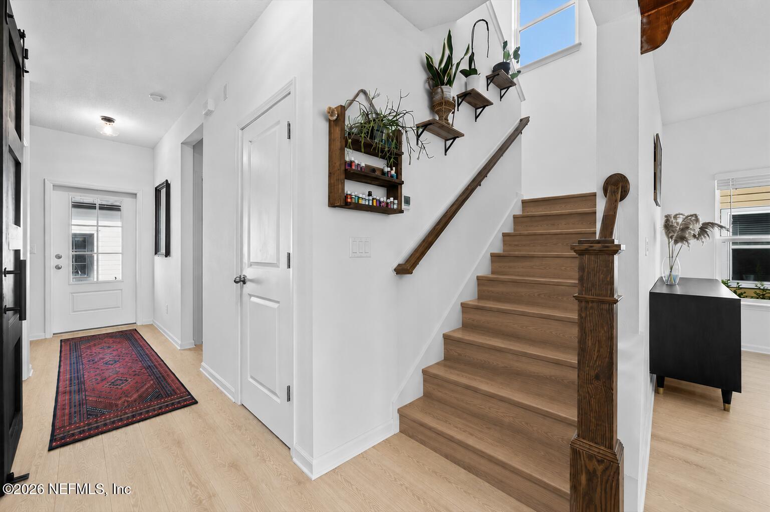 92 Patina Place St. Augustine, FL 32092 - Photo 16 of 26 a view of entryway and hall with wooden floor