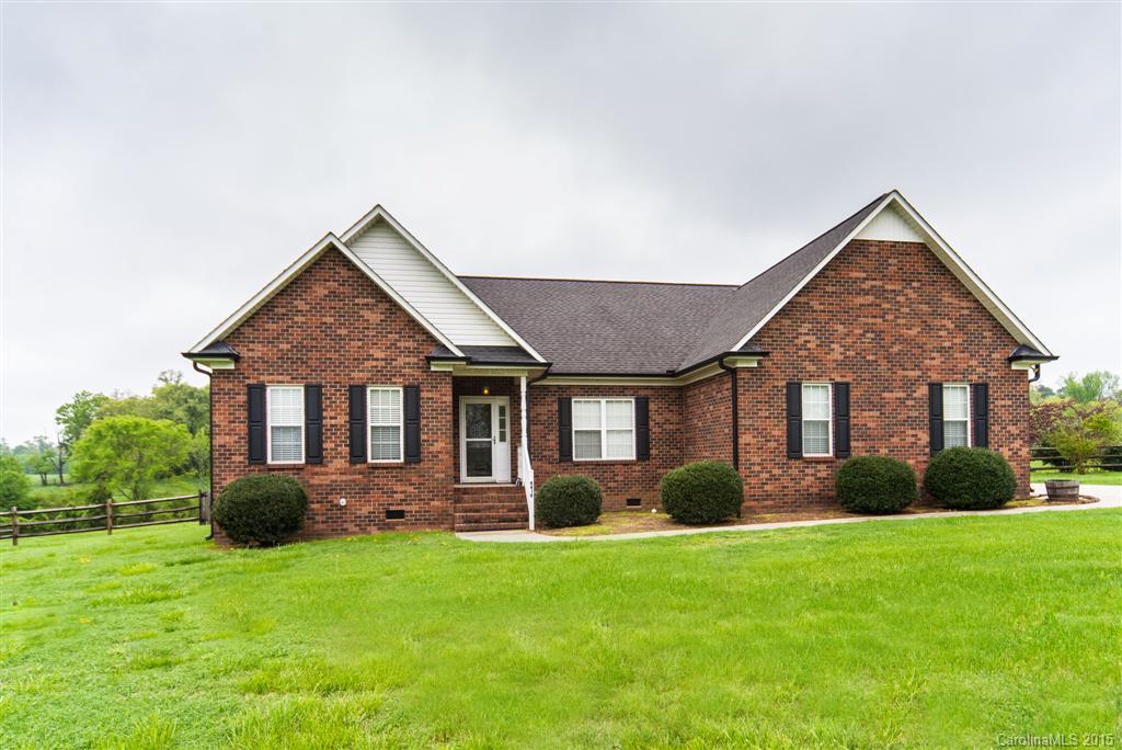 4419 Zack Road Monroe, NC 28110 - Photo 1 of 17 a front view of house with yard and green space