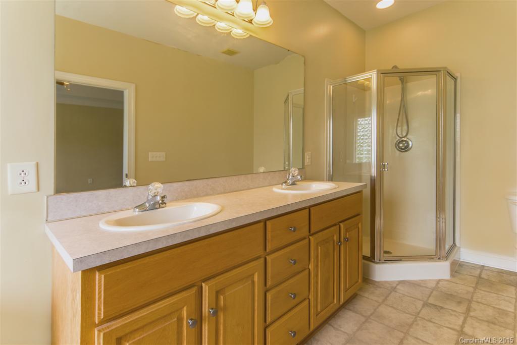 4419 Zack Road Monroe, NC 28110 - Photo 11 of 17 a bathroom with a double vanity sink mirror and double