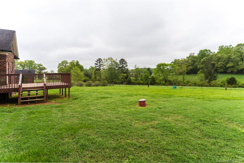 4419 Zack Road Monroe, NC 28110 - Photo 16 of 17 a view of a garden with an outdoor space