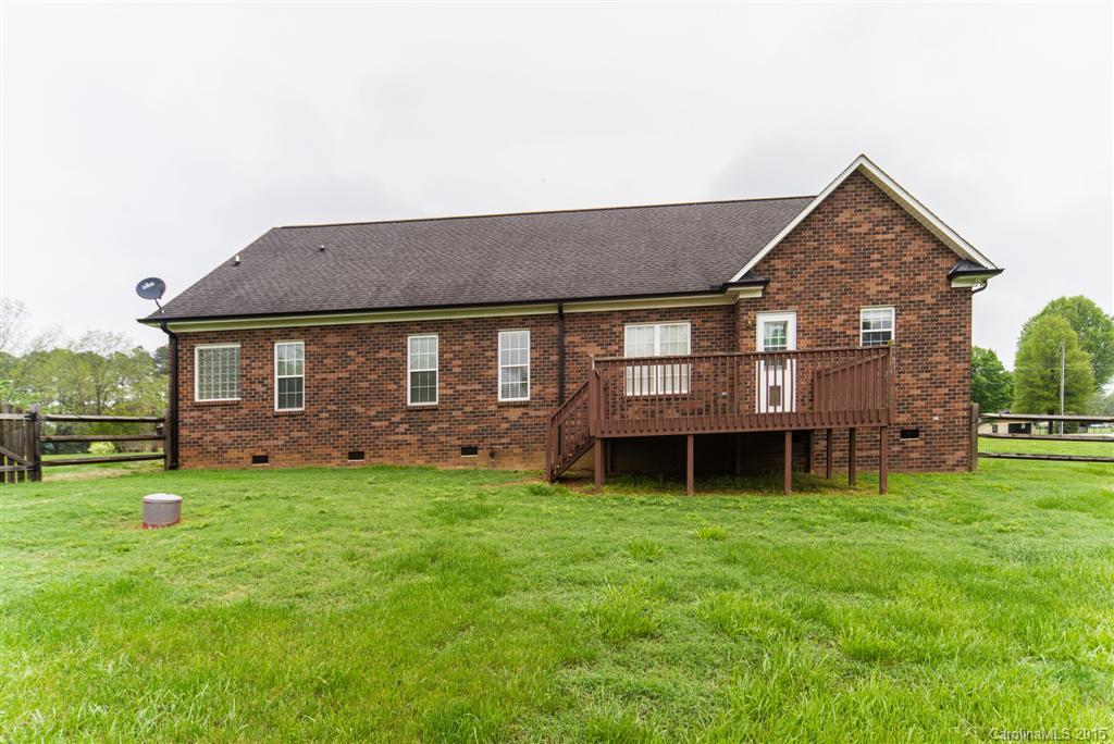 4419 Zack Road Monroe, NC 28110 - Photo 17 of 17 a front view of a house with a garden