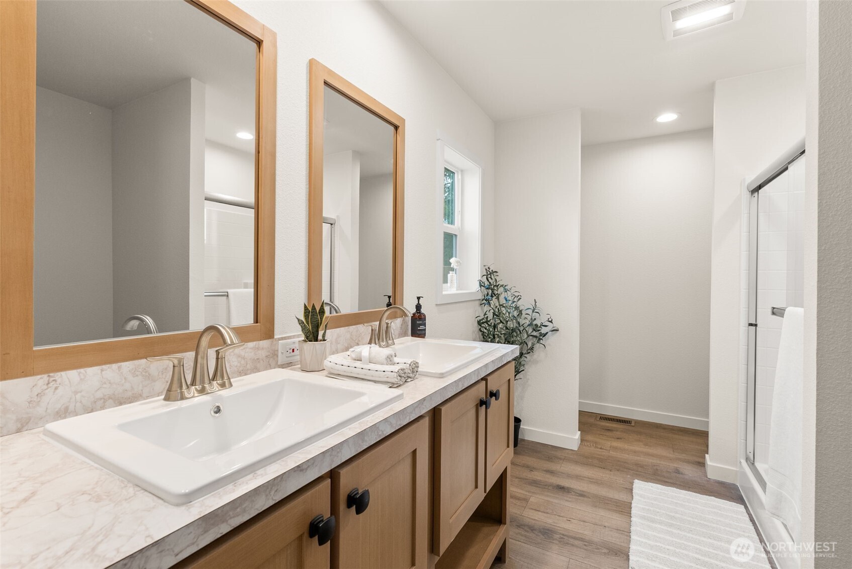 1110 Koontz Road Chehalis, WA 98532 - Photo 13 of 33 a bathroom with a double vanity sink and a mirror