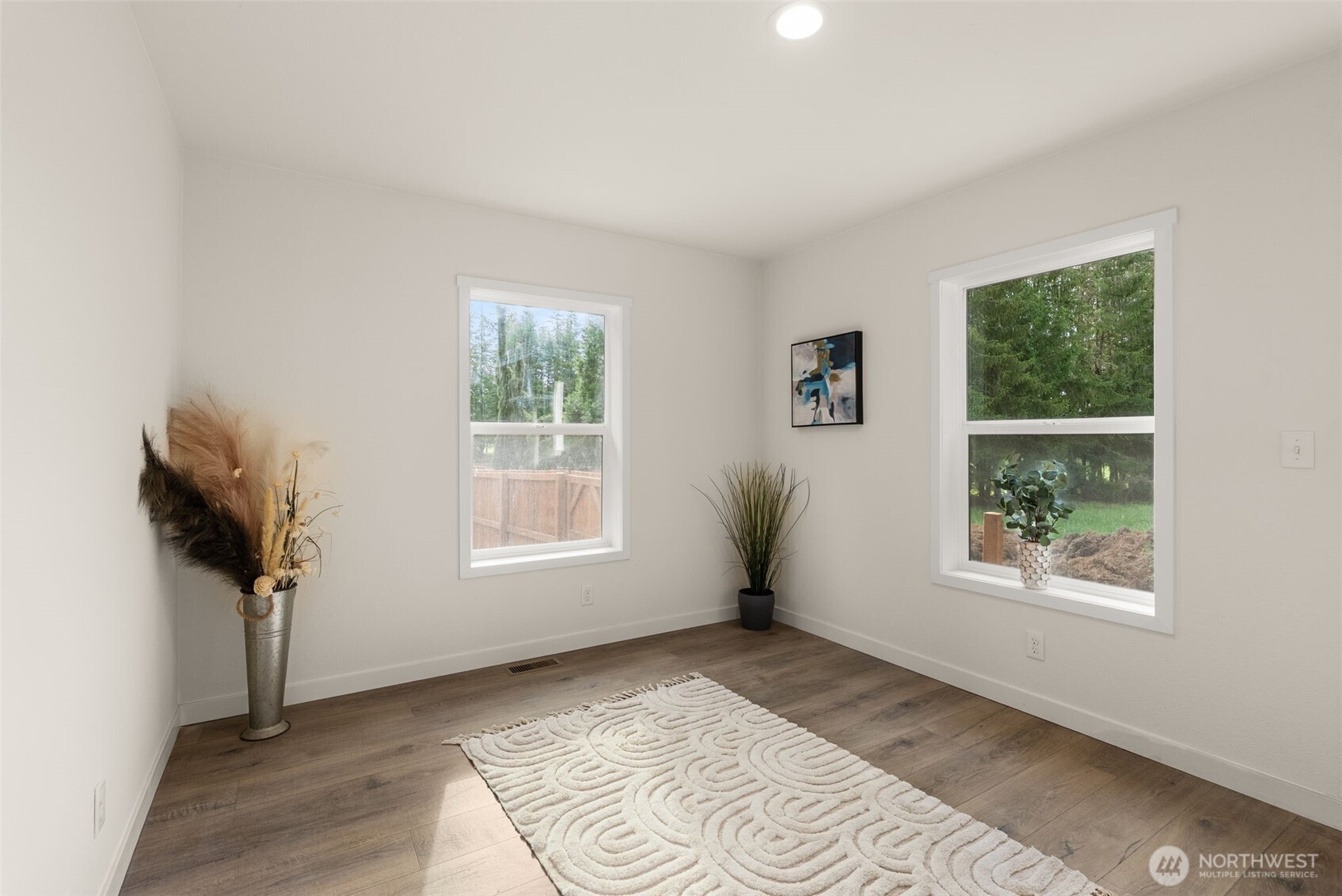 1110 Koontz Road Chehalis, WA 98532 - Photo 19 of 33 a view of an empty room with a window and a kitchen