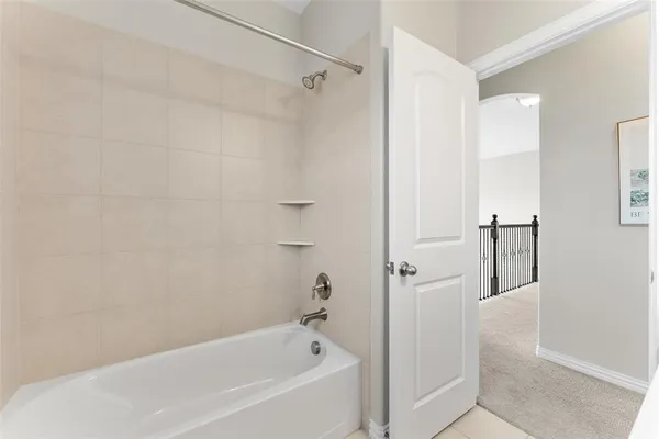 a bathroom with a bathtub
