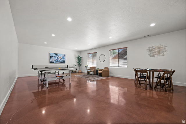507 West Windmill Gate Cove Draper, UT 84020 - Photo 35 of 46 Game room with finished concrete flooring and recessed lighting