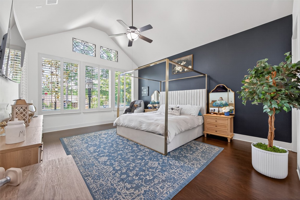 19852 Cullen Ridge Drive Porter, TX 77365 - Photo 2 of 43 Huge Primary bedroom features high vaulted ceilings in the room as well as in the adjoining primary ensuite bath!